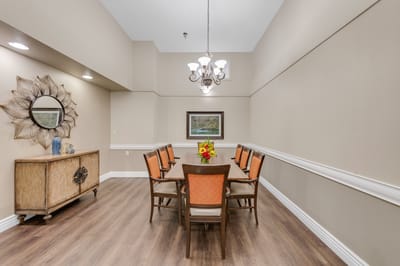 Elegant dining room with a large table and chairs