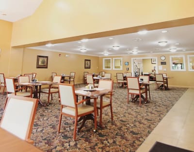 Dining area with tables and chairs set up