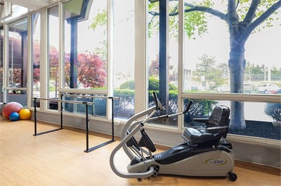 Exercise equipment in a well-lit fitness area