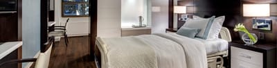 Private resident room with a bed and modern decor