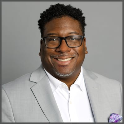 Portrait of a smiling man in a suit