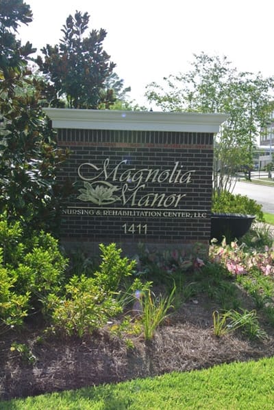 Exterior sign of Magnolia Manor Nursing and Rehabilitation Center