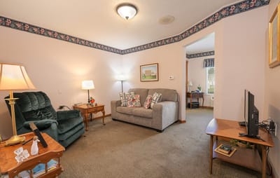 Cozy interior resident room with seating and decor