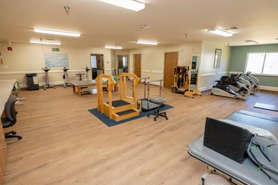 Well-equipped therapy room with exercise equipment