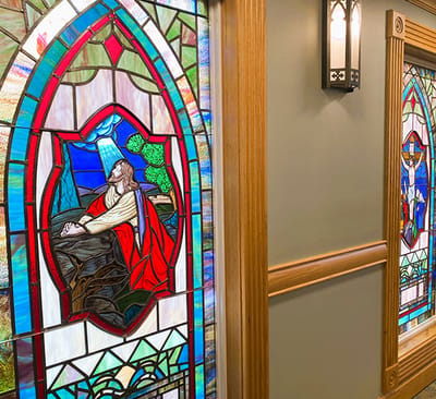 Stained glass windows in a facility interior