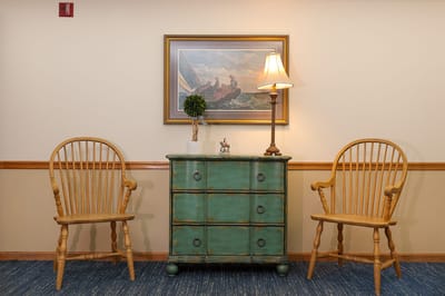 Cozy interior setup with chairs and a lamp