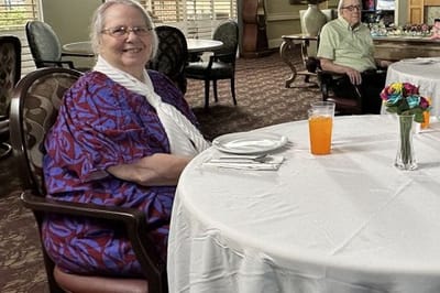 Residents enjoying a meal in the dining area