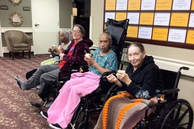 Residents enjoying ice cream in a common area