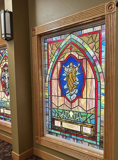 Stained glass window showing religious figures