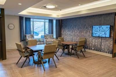 Common area with seating and a television