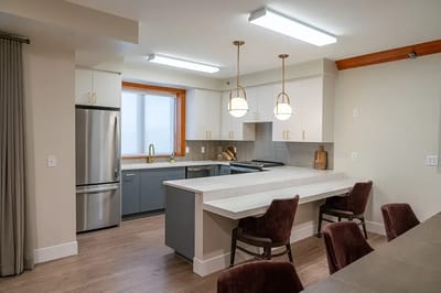 Modern kitchen interior with bar seating