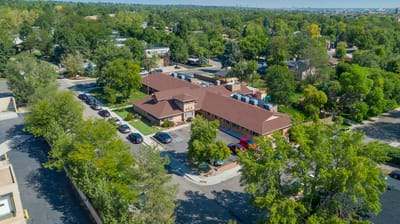 Aerial view of Littleton Care and Rehabilitation Center surrounded by trees