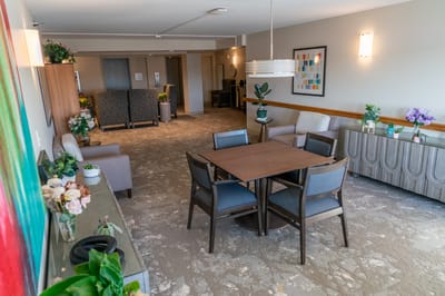 Bright communal area with seating and decor