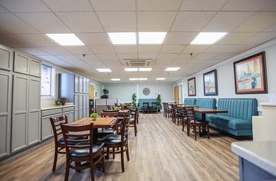 Bright dining area with tables and seating