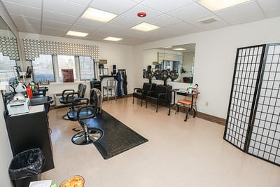 Stylish salon interior with hair styling stations