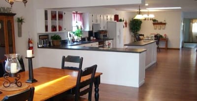 Spacious interior of a dining area with kitchen