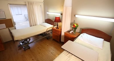 Interior view of a shared resident room with two beds
