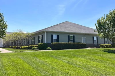 Exterior view of Arcadian Cove Senior Living building