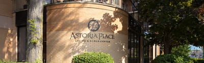 Exterior logo sign of Astoria Place facility