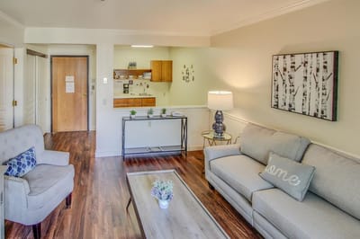 Bright and welcoming living room in a resident unit