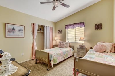 A cozy shared bedroom in the facility