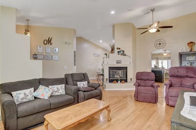 Cozy common area with comfortable seating and a fireplace