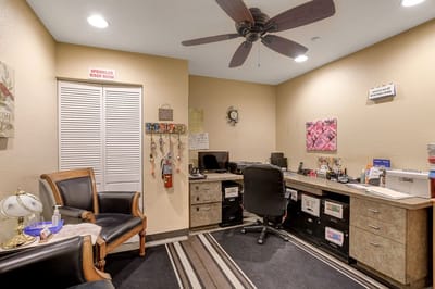 Interior view of an office space with desk and chair