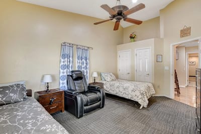 Interior view of a spacious resident room with two beds