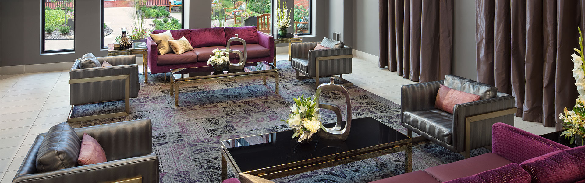 Bright common area with comfortable seating and decor