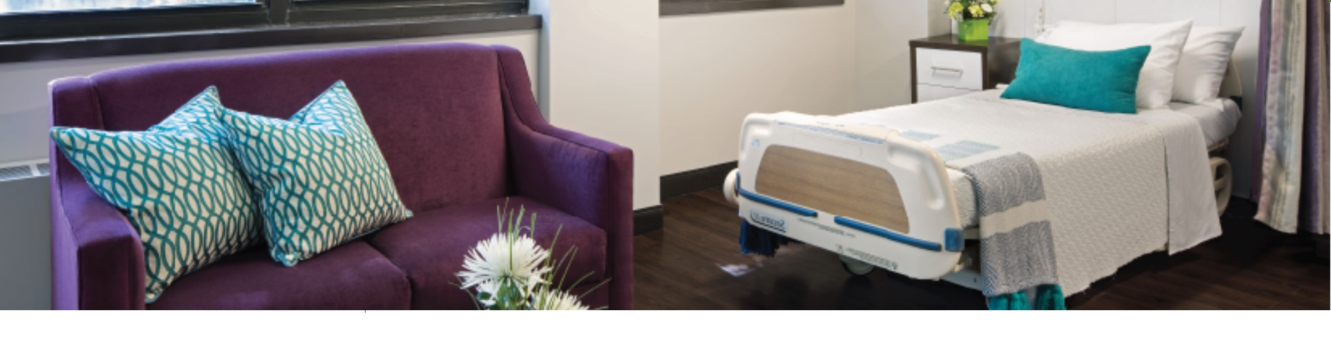 Stylish common area with a couch and a bed