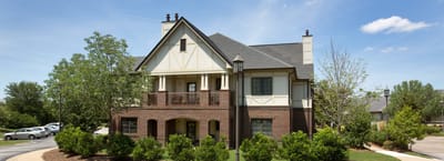 Exterior view of Oak Grove Inn, showcasing architecture and landscaping.