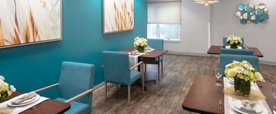 Dining area with elegant table settings and decor