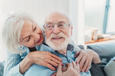 Old Cheney Rehabilitation, Nursing Home in Lincoln, NE — Elderly couple enjoying a joyful moment together
