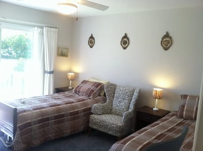 Bright and inviting shared resident room with twin beds