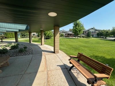 Pathway and bench in a landscaped outdoor area