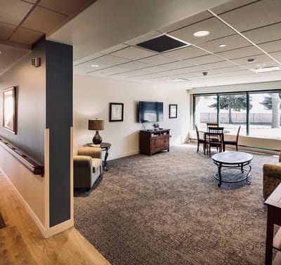 Common area with seating and a television
