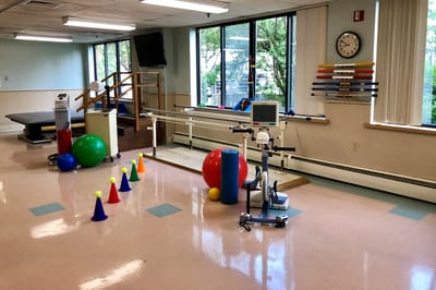 Rehabilitation facility interior with exercise equipment