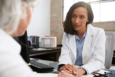 Healthcare professional engaged with a resident