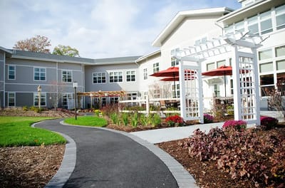 Outdoor pathway leading to a residential facility