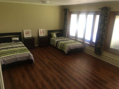 Spacious resident room with two twin beds