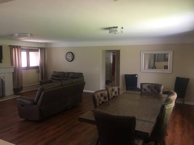 Common area with seating and dining table.