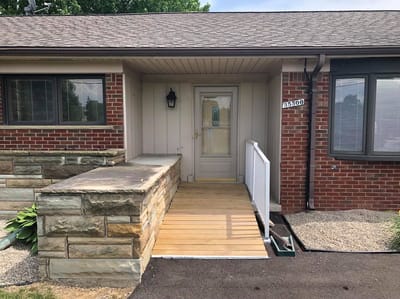 Exterior entrance of a senior living facility.