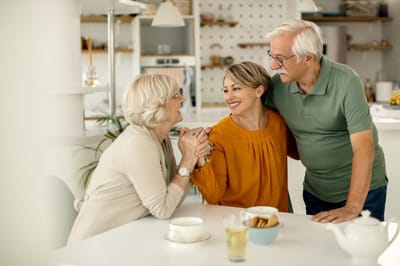 Residents sharing a joyful moment in a communal area