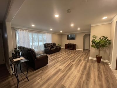 Cozy lounge area with seating and TV