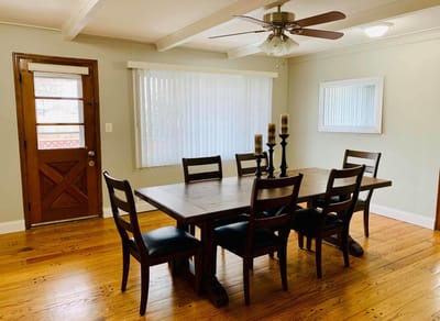 Dining area with wooden table and seating