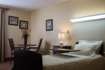 Cozy resident room with light and décor.
