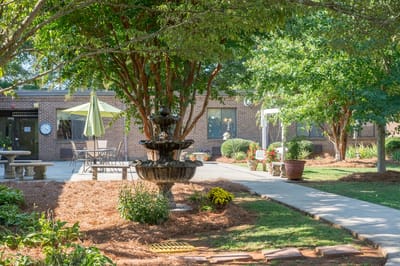 Outdoor area with a fountain and seating