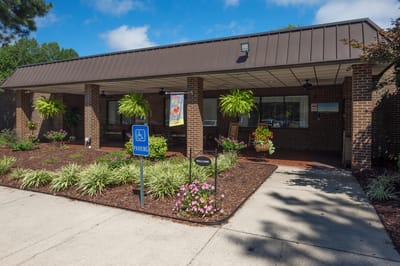 Exterior view of White Oak of Columbia with landscaping.
