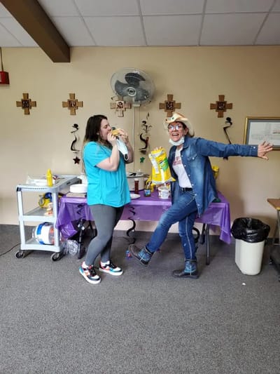 Residents enjoying an activity with snacks