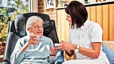 Caregiver assisting an elderly resident